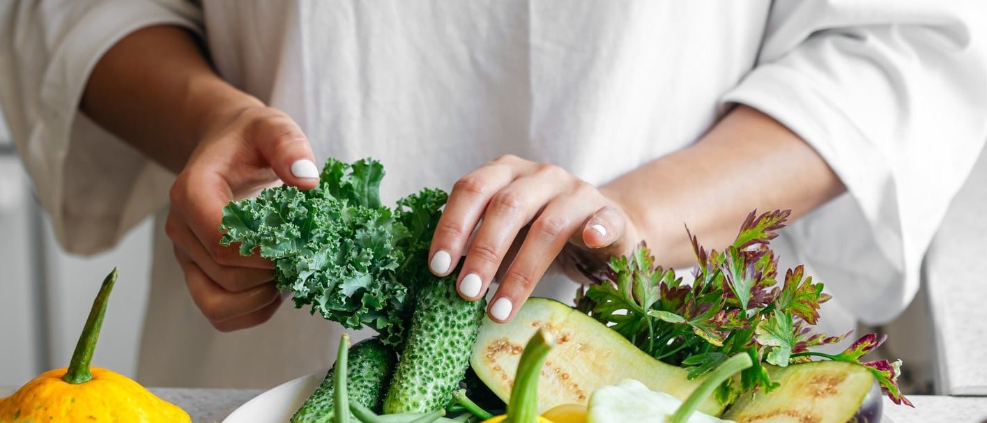 woman cutting vegetables